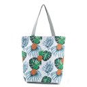Damska torba płócienna z nadrukiem ananasów i tropikalnych liści Przestronny shopper z dwoma szarymi uchwytami 27 x 38 x 11 cm Płótno i poliester 4