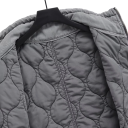 Dámská zimní šedá vesta s výstřihem do O a tkaničkou v pase Stylová jednobarevná vesta s kapsičkami a zapínáním na knoflíky Lehký polyester 9
