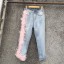 Dámske džínsy s ružovými strapcami 5