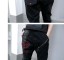 Dámske slim nohavice so zipsom čierne 3