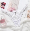 Damskie koronkowe tanga z kokardką i błyszczącym zawieszką z przodu Cienkie błyszczące boczne paski z kółkami Nylon i spandex Uniwersalny 1