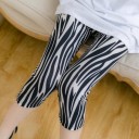 Damskie legginsy capri ze wzorem 7