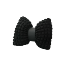 Dekorační polštářek ve tvaru mašle strukturovaný textilní s reliéfním povrchem designový doplněk na sedačku postel 2