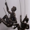 Dekorativ statue af en klatrer 2
