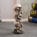 Dekorativ statuette med kranier 3