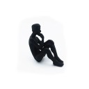 Dekorativ statuette på en stige 2