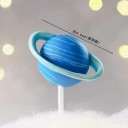 Dekorativ tårtdekoration i form av en planet. Färgglad rymddekoration av latex med valfritt motiv. 4