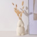 Dekorativ vase formet som en kvindekrop 8