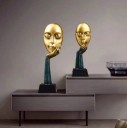 Dekorativt statueansigt 1