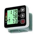 Digitální tlakoměr na zápěstí s LCD displejem Rozměry 6,6 x 7,5 cm Paměť 99 měření a 2 profily Bílo-černý Na domácí měření tlaku a tepu 1