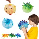 Dinosauro gonfiabile per bambini Giocattolo di gomma e palloncino in uno Dopo il gonfiaggio forma rotonda Manico per tenere 11 x 6 cm Colore casuale 1