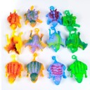 Dinosauro gonfiabile per bambini Giocattolo di gomma e palloncino in uno Dopo il gonfiaggio forma rotonda Manico per tenere 11 x 6 cm Colore casuale 3