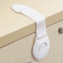 Dispositif de sécurité pour tiroirs et portes de placard 10 pcs Corps en plastique avec bouton Sangle flexible sur le bord du meuble Blanc 3