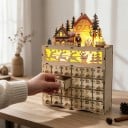 Drevený adventný kalendár s LED osvetlením Zimná dedinka so Santom 24 šuplíkov 22,5 x 10,5 x 35,5 cm Prírodné drevo Vianočná dekorácia 3