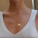 Dubbelhalsband för kvinnor med en blomma i en cirkel 1