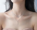 Dubbelhalsband för kvinnor med stång 1