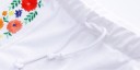 Dziecięce szorty w kwiaty - Białe 3