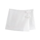 Elegancka damska mini spódniczka z kokardą Obcisła krótka spódniczka z ozdobą Elegancka krótka spódniczka do miasta Strój do pracy i na wieczór 4