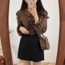 Elegant bluse med knapper 2