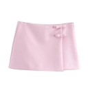 Elegantná dámska mini sukňa s mašľou Upnutá krátka sukňa s dekorom Elegantná kraťasová sukňa do mesta Pracovný a večerný outfit 5