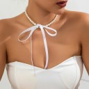 Elegantný dámsky perlový choker 38 cm s farebnou mašľou, viazanie na mašľu 5