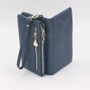 Elegantti naisten lompakko ensiluokkaisesta keinonahasta 18,5x3x9,5 cm, yli 12 lokeroa, kolikkotaskut, irrotettava hihna, valokuvaikkuna 4