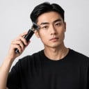 Elektrický zastrihávač vlasov a okrajov s T čepeľou Dobíjací cez USB-C Výdrž 120 minút Hrebene 1,5 až 4 mm Čierny Pánsky holiaci strojček 6