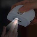 Elektryczny automatyczny obcinacz do paznokci 6,5 x 6,3 cm biały, ładowany przez USB, trymer z latarką, blokada dziecięca, manicure, pedicure 4