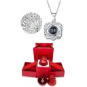Ensemble de collier projeté Cœurs liés Chaîne en titane Pendentif en cuivre Projection Je t'aime en 100 langues Boîte en forme de rose 3