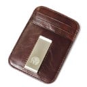 Etui podróżne na dokumenty z przegródkami na karty i metalowym zapięciem Płaskie wykonanie z prawdziwej skóry Szyte krawędzie Wymiary 10,8 x 2