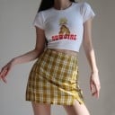 Falda corta de cuadros para mujer con pantalones cortos ocultos Corte corto en forma de A Dos aberturas en la parte delantera Tejido 9