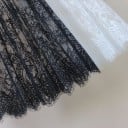 Falda de encaje transparente para mujer con patrón floral Dobladillo de flecos suave Cintura elástica Corte holgado y fruncido Poliéster ligero 6