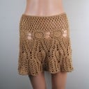 Falda mini de encaje para mujer con patrón de ganchillo Corte en A ampliado Cintura con ornamentos circulares Dobladillo ondulado 3