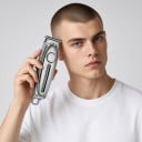 Férfi haj- és szakállvágó Befejező trimmer Fémházas 16 x 4 cm 1400 mAh Üzemidő 180 perc 3 fésű 1–3 mm Kontúrokhoz és részletekhez 5