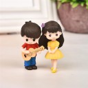 Figurines décoratives garçon et fille 1