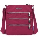 Flat women's nylon crossbody bag with three front zip pockets Internal pockets Adjustable strap Dimensions 21 x 25 x 3 cm 11