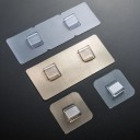 Gancio adesivo in plastica 1