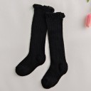 Gestrickte Mädchensocken mit Rüschen 2