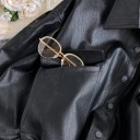 Giacca corta da donna in pelle sintetica nera con colletto a camicia Chiusura con bottoni a pressione Grandi tasche sul petto Cordino regolabile 4