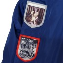 Giacca da corsa blu scuro con toppe sulle maniche e striscia rosso-bianca davanti con colletto alto e polsini elastici unisex 10