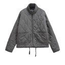 Giacca da donna grigia trapuntata con colletto Giacca leggera primaverile con zip Giacca elegante per la transizione con tasche Orlo inferiore 1