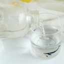 Glass Travel Drinking Bottle with Textile Cover and Drawstring Ocean Motif Screw Cap Capacity 1000 ml Dimensions 25.8 x 8.5 cm 5