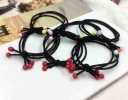 Gommette noire pour cheveux avec perles 1