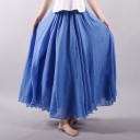 Gonna lunga da donna in cotone e lino Taglio ampio e fluido con vita arricciata Tessuto leggero e fluttuante Orlo ondulato Lunghezza maxi fino 15