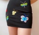 Gonna nera mini da donna con farfalle ricamate Gonna a tubino aderente sopra il ginocchio con zip sul retro Poliestere spandex e microfibra 4