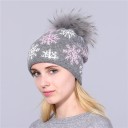 Gorro de invierno para mujer con copos de nieve. 10