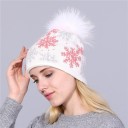 Gorro de invierno para mujer con copos de nieve. 11