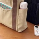 Grande mala de lona a tiracolo com bolsos 6