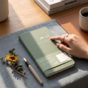 Green Weekly Diary 187 x 94 mm for 53 Weeks with a Drawing of Mountains and Trees on the Cover for Time Management and Notes on Gridded Pages 5