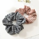 Gumiça de cabelo em camurça 1